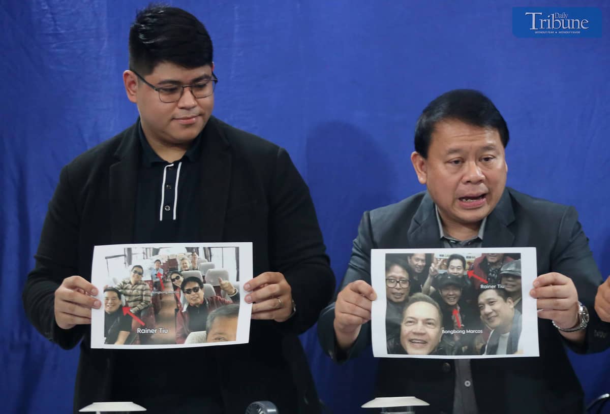(September 7 2024)…………………On Saturday, September 7, 2024, at a press conference in Quezon Atty. Ferdinand Topacio, Cassandra Ong's legal counsel, along with Atty. Raph Andrada shows a photo of President Ferdinand Bong Bong Marcos and POGO owner Rainier Tiu………..Photo/Analy Labor
